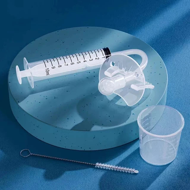 Caja contenedora del dosificador de medicamentos para bebés.