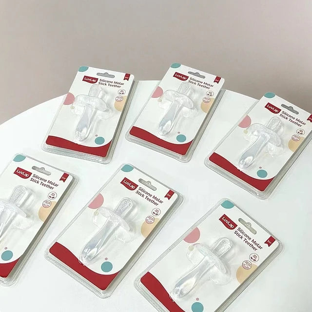 Cepillo de silicona para bebés, diseño sin cerdas para un cuidado seguro y efectivo.