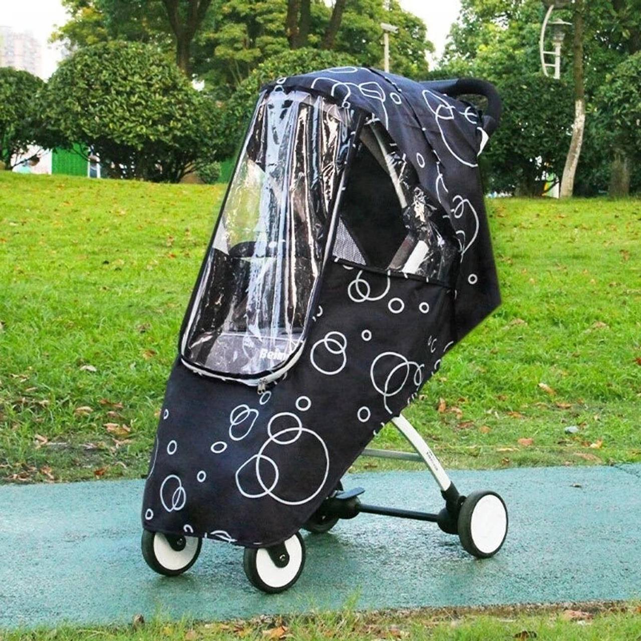 Cubre coche para bebé negro, fucsia y azul marino, resistente al viento y lluvia.